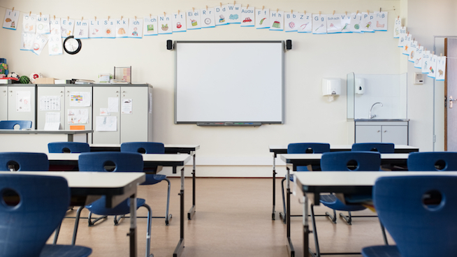 Empty classroom with whiteboard